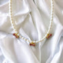 PERLA BOWS NECKLACE
